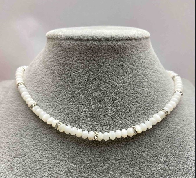 Choker with natural mother-of-pearl rondelle beads 5x3 mm +/- with metal inserts and white rhinestones, length 35-43 cm +/-