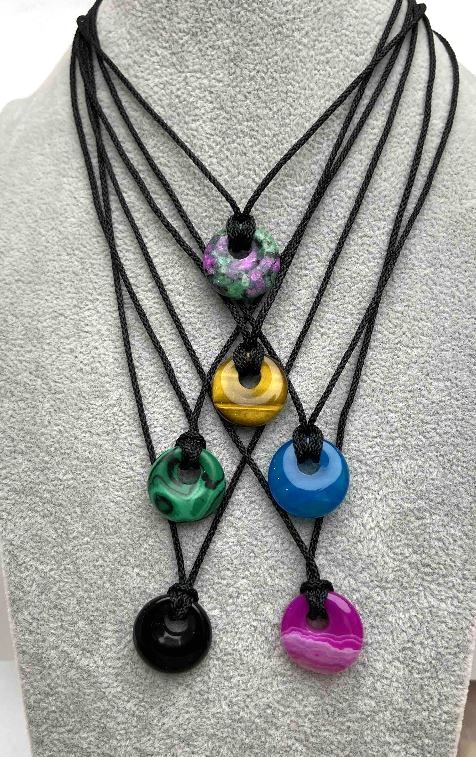 Black braided necklace cord, 1.9 mm diameter with donut pendant, 18 mm diameter, length approximately 58 cm with adjustable length