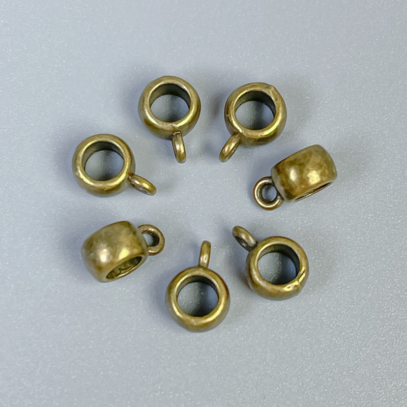 Bronze-colored bail findings, size 9×4×6 mm, holes with diameters 4 mm and 1.5 mm, packaging 40 pcs
