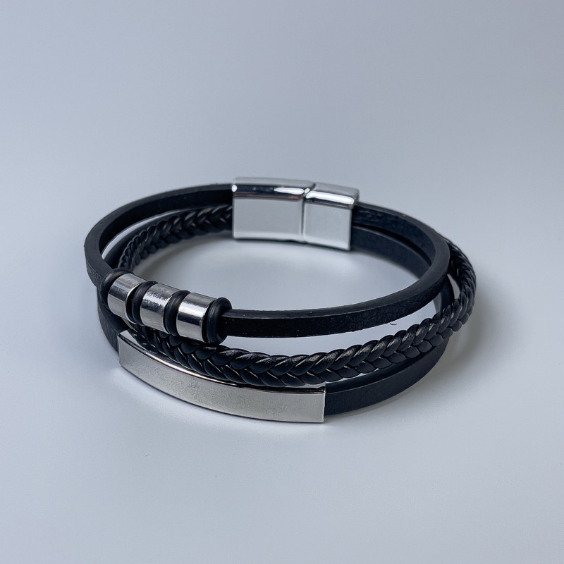 Men's black eco-leather bracelet with metal inserts, thickness 10-20 mm, length 22 cm, silver-toned metal on the clasp