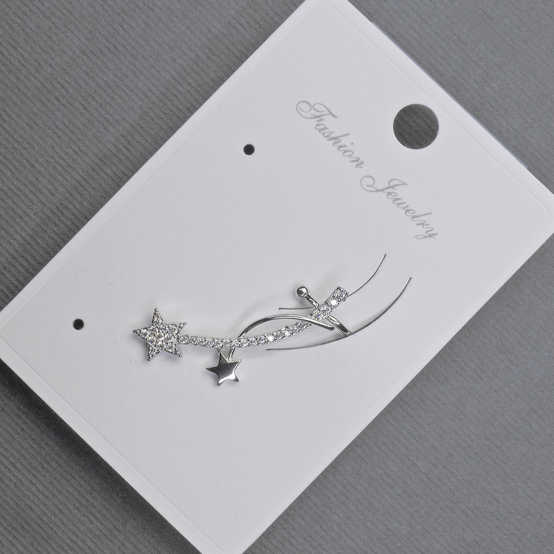 Gold-tone stud earring with kaf on the earlobe, 11x28 mm ± white crystals