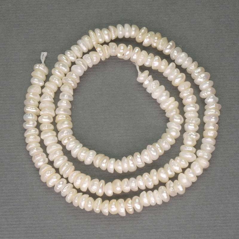 Freshwater White Pearls on a Thread, diameter 2×4–4.5 mm, on a thread, length 36 cm