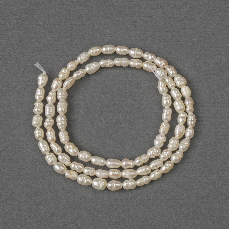 Beads of natural freshwater pearls 4x3 mm, length about 34 cm on a thread