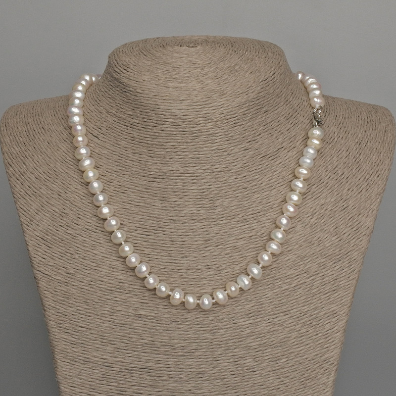 Necklace of natural freshwater pearls 8x6-6.5 mm, length 46 cm, with clasp
