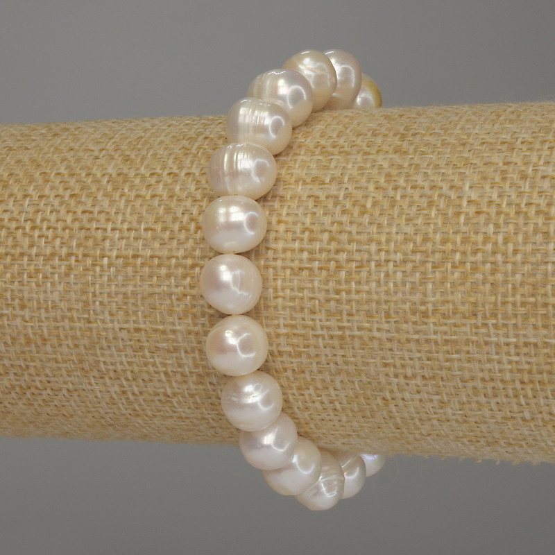 Bracelet with freshwater pearls, diameter 9×8 mm +/-, length 18 cm (stretch)