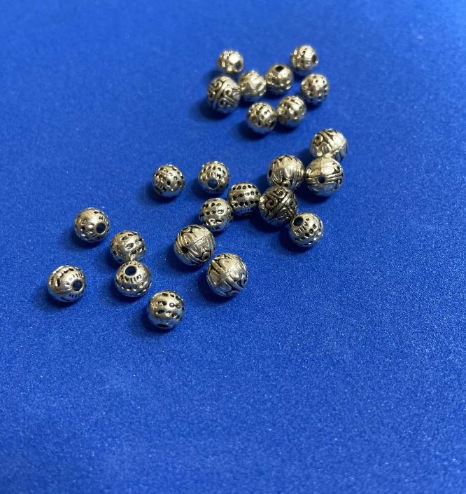 Bead-insert finding, 7 mm diameter, inner diameter 2 mm, packaging 20 g, approx. 20 pcs