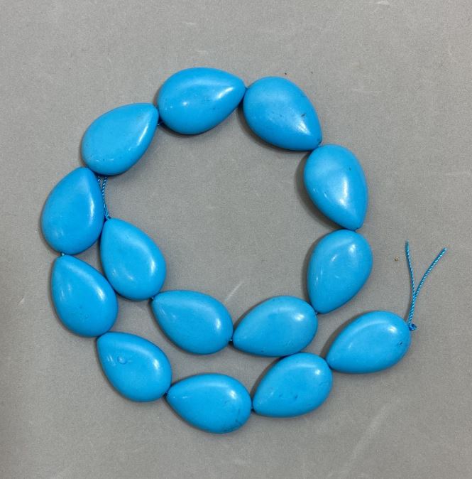 Turquoise pressed teardrop beads, diameter 28x19 mm, length 40 cm +-