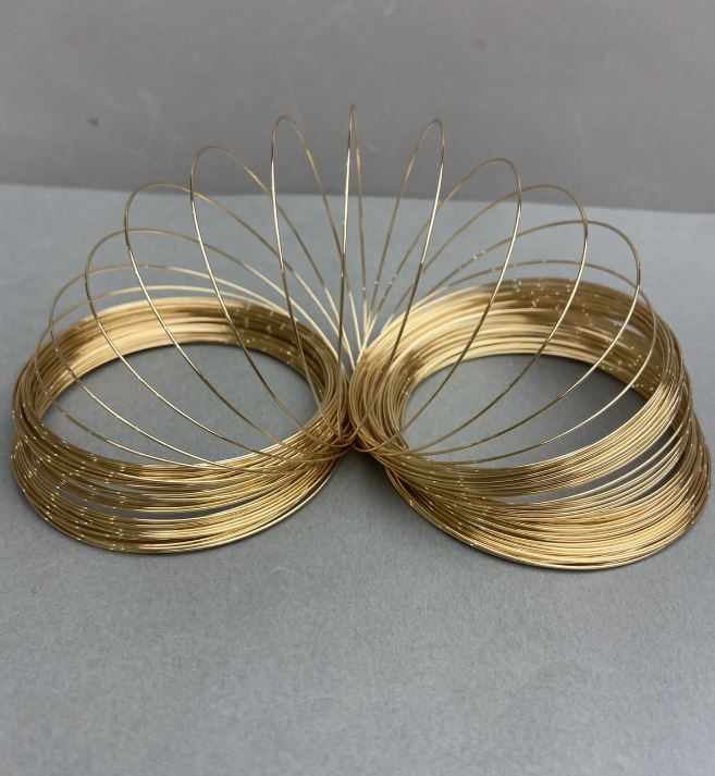 Memory wire, 0.8 mm diameter, 10 cm coil diameter, gold-colored metal