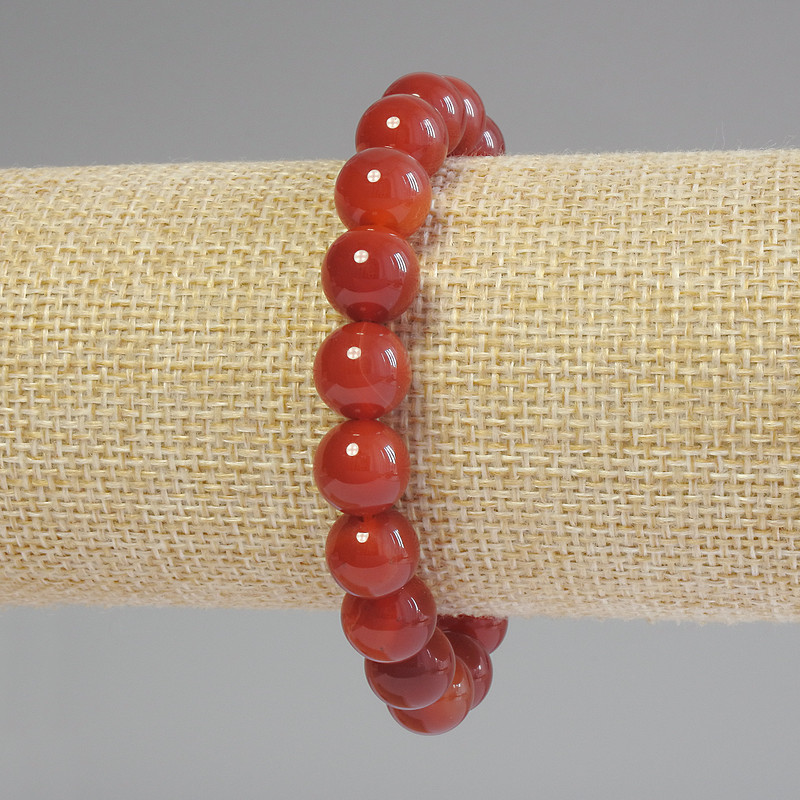 Carnelian bracelet with smooth beads, 10mm diameter ±, 18mm length ±, stretch