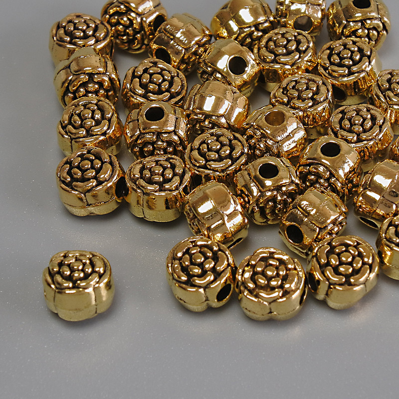 Flower-shaped bead insert, gold color, 6x5mm diameter, 1.9mm hole, packaging 20 g (~32 pcs)