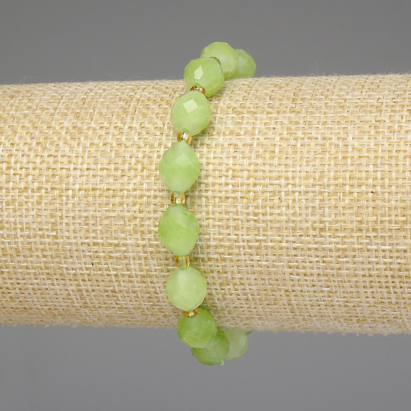 Bracelet Chrysoprase Olivine faceted beads 9x8 mm +/- spacer 3 mm +/- length 18 cm +/- stretch