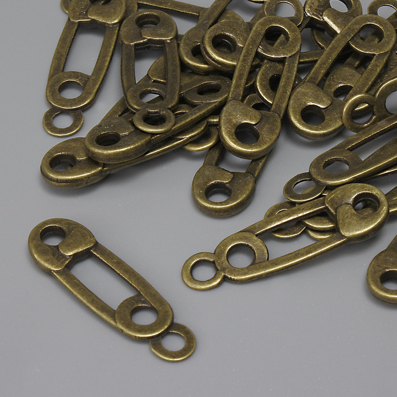 Spike Pendant, bronze metal color, diameter 23×7 mm, ear hole approx. 2.2 mm, packaging 22 pcs