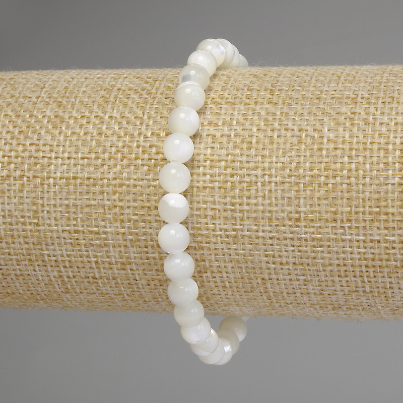 Stretch bracelet with smooth mother-of-pearl beads, 6 mm diameter, 18 cm length