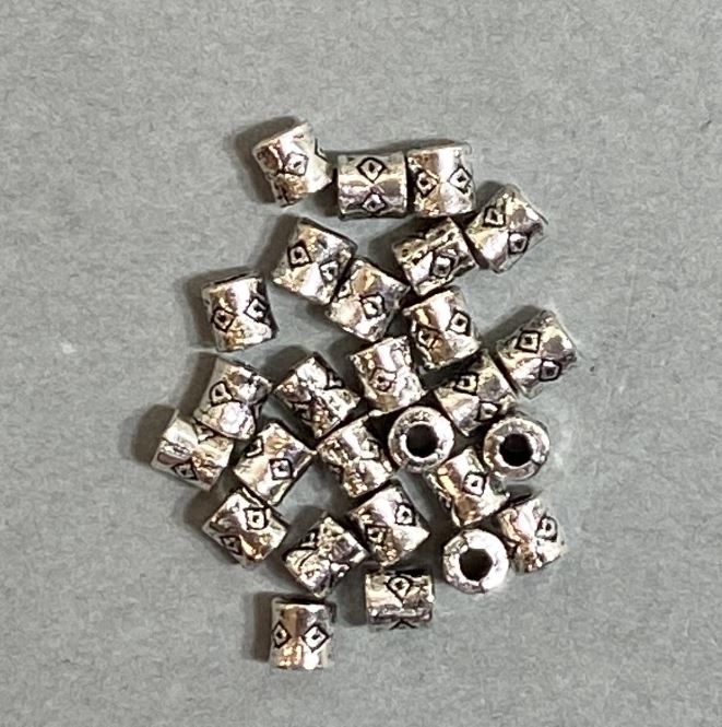 Bead insert findings in silver metal color, 4x3 mm diameter with a 2 mm hole, packaging 20 g (approx. 110 pcs)