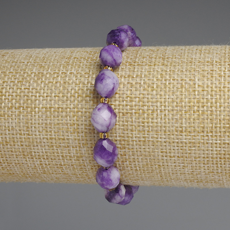 Sugilite bracelet with faceted grains, diameter 10×8.5 mm, 5 mm+ seed beads and 3 mm+ beads, length 18 cm, stretch