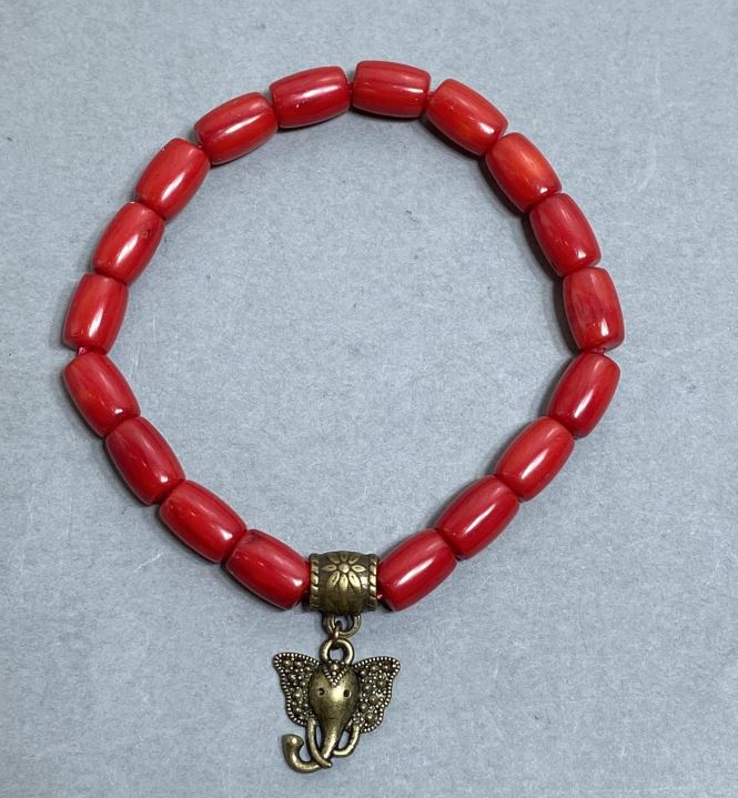 Bracelet Coral Barrel 9.5×6.5 mm with inlay, length 18 mm +- elastic