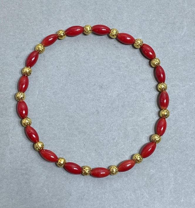 Coral Grain Bracelet 8x4mm +/- with Metal Inserts, Length 18mm +/- Stretch