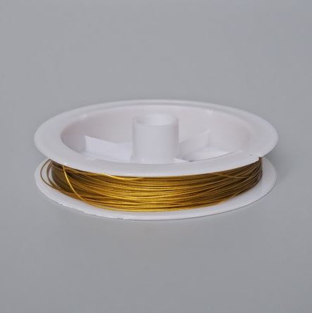 Clearance! Bronze-colored wire spool, 50 m (±), 0.45 mm diameter (rust present)