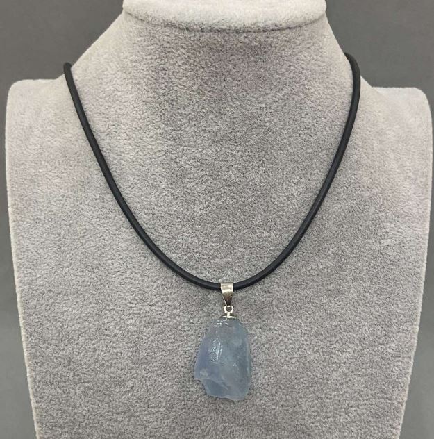 Unpolished Aquamarine Pendant, assorted diameter 31×16–37–18 mm +/- on cord, cord diameter 2.5 mm +/-, length 50 cm +/- chain