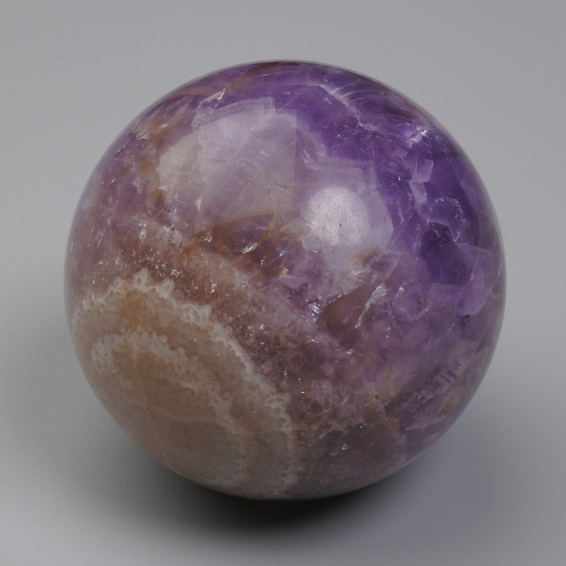 Price per 100 g! Souvenir sphere made of natural amethyst with agate, diameter 52mm+