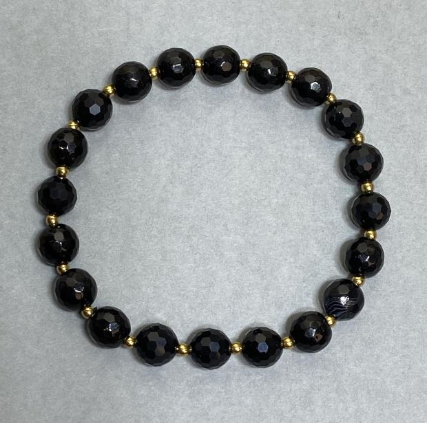 Bracelet with Czech crystal faceted beads 7mm +/- with metal inserts, length 18 cm +/- stretch