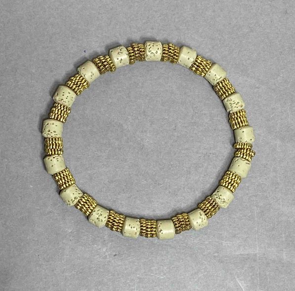 Lava bracelet with cylindrical beads 6x6 mm ±, with metal inserts, length 18 cm ±, elastic