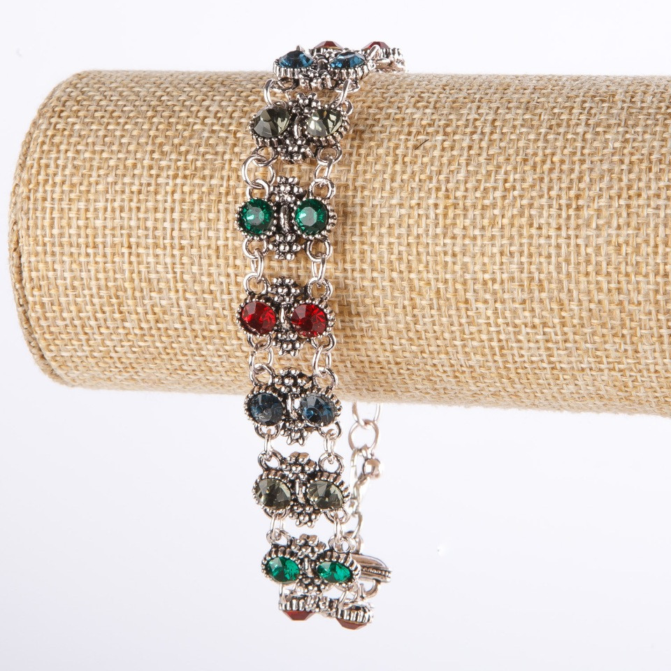 Two-row bracelet with colored crystals in a 'drip silver' finish, length 17–22 cm