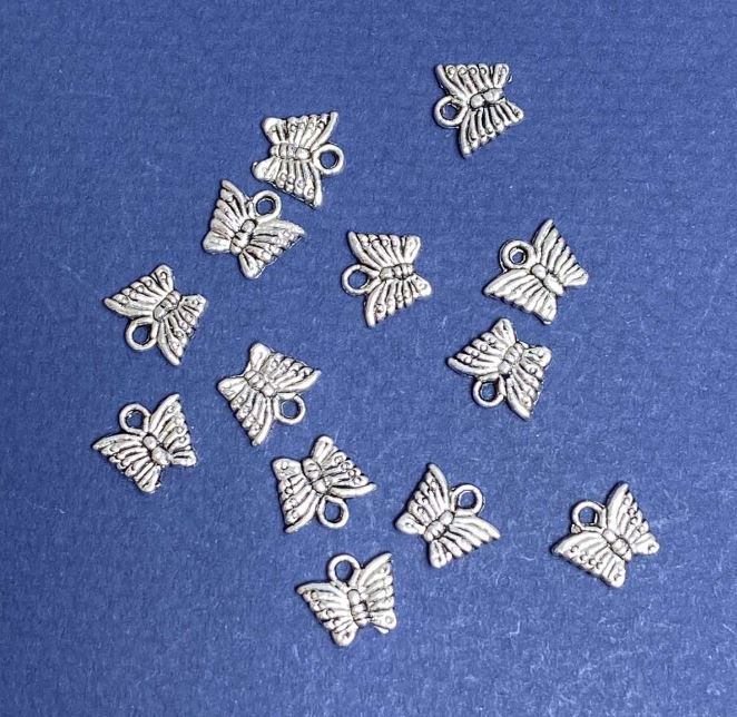 Butterfly pendant findings, silver color, 9x10 mm, packaging 20 g ± 40 pcs