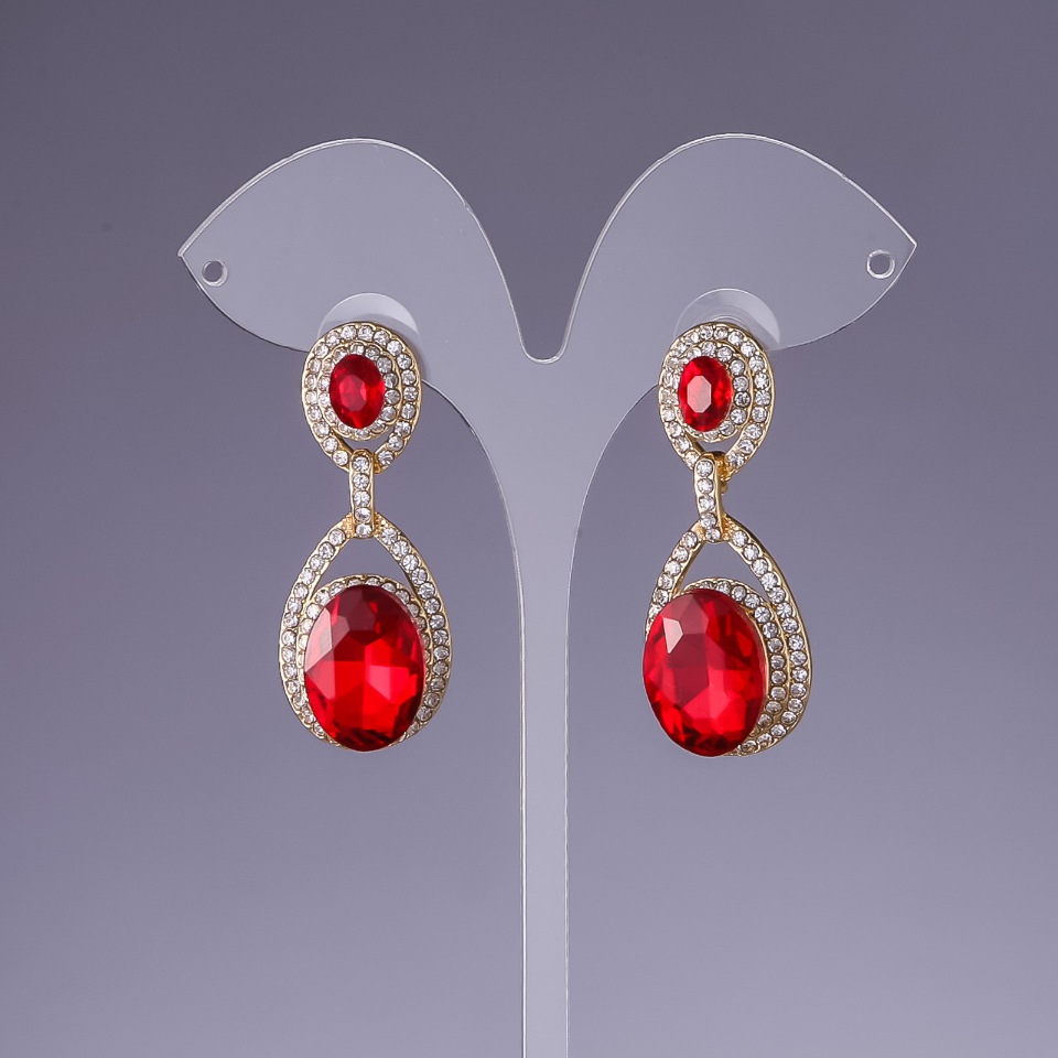 Earrings with red crystals, length 4.5 cm, yellow metal