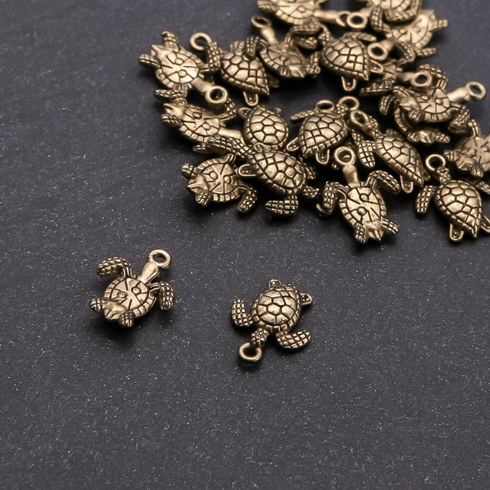 Bronze Turtle Fittings, diameter 1.5 mm, length 16x13 mm, packaging 20 g +/- 22 pcs