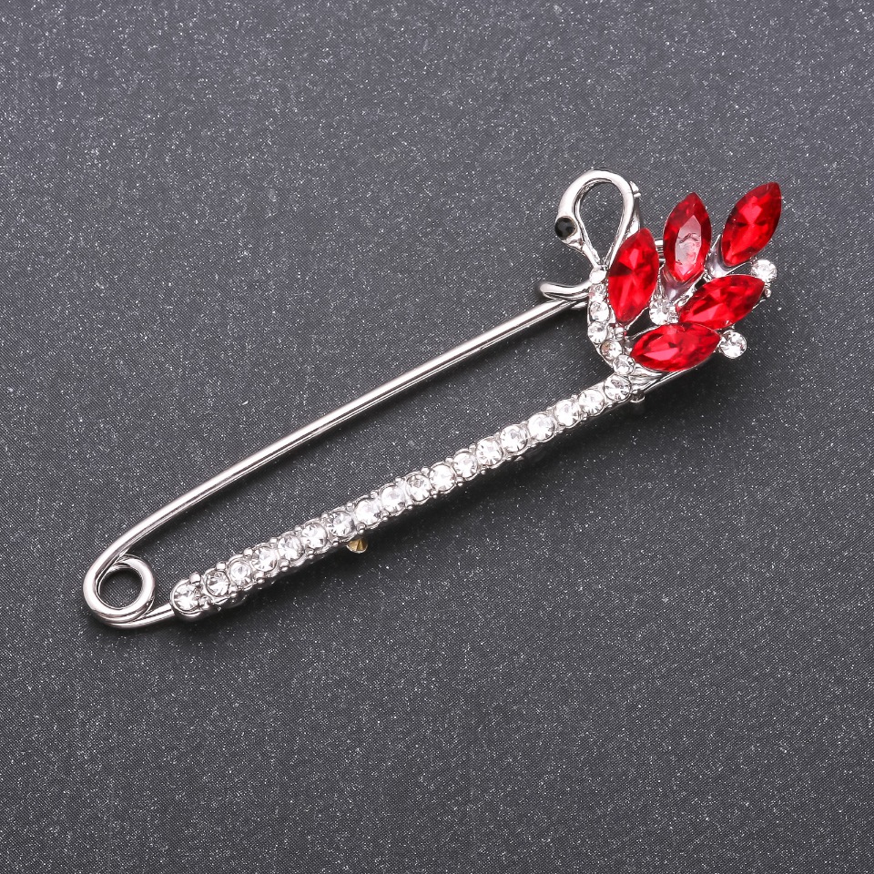 Brooch pin with red glass crystals, 73×22 mm, white metal
