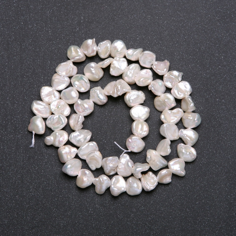 Natural baroque pearl beads on a string with a warm "petrol" sheen, warm shade, diameter 8 mm, length 40 cm (+/-)