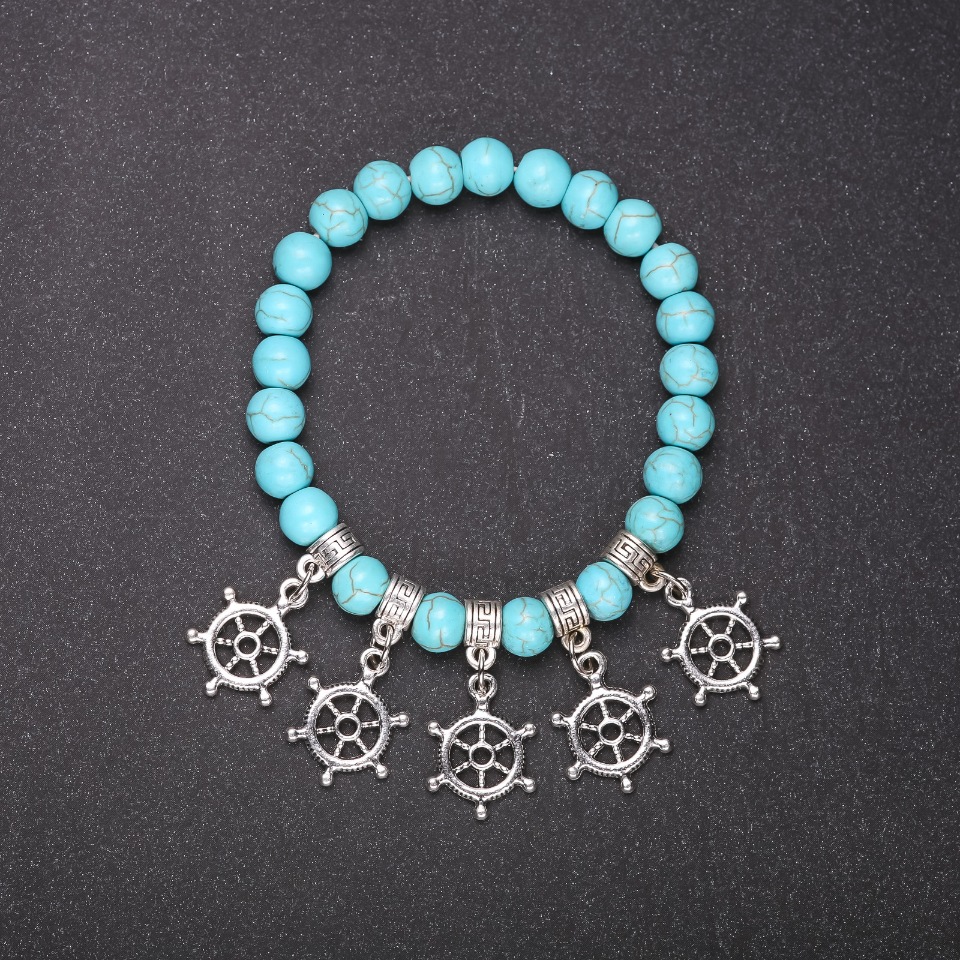 Turquoise Bracelet (artificial) with Steering Wheel Pendants, smooth beads, 8mm diameter, 18cm length on elastic