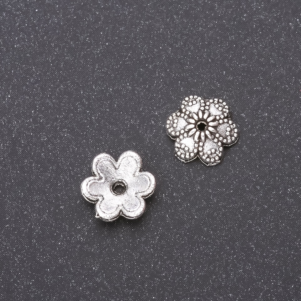 Silver end cap for beads, 9 mm, inner diameter 1.8 mm, packaging 20 g (48 +/- pcs). Color: silver metal