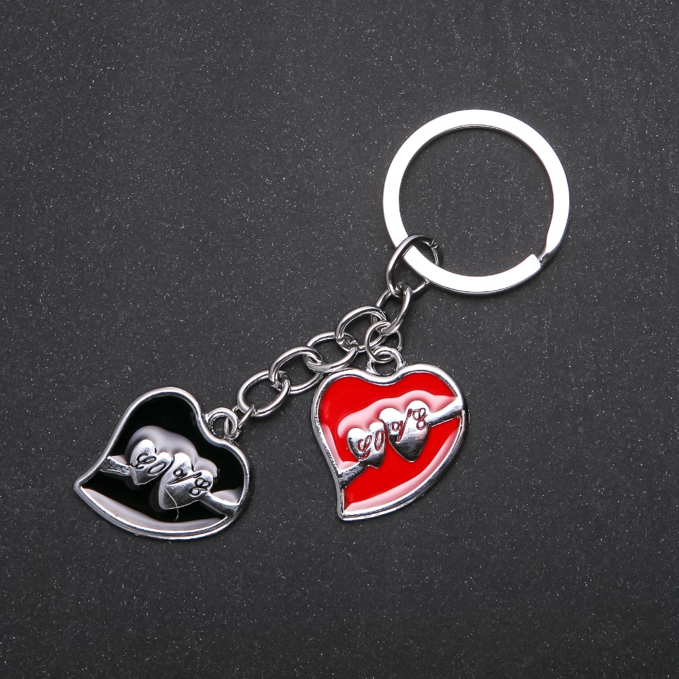 Heart-shaped keychain in metal color 'silver', length 95mm