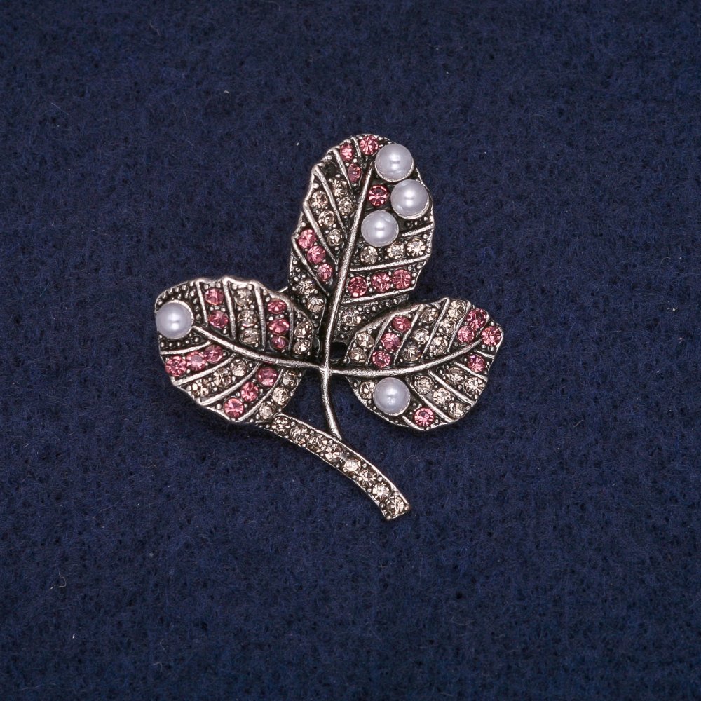 Brooch 'Leaves on a Branch' with beads, white and pink rhinestones, gray metal 29×32 mm