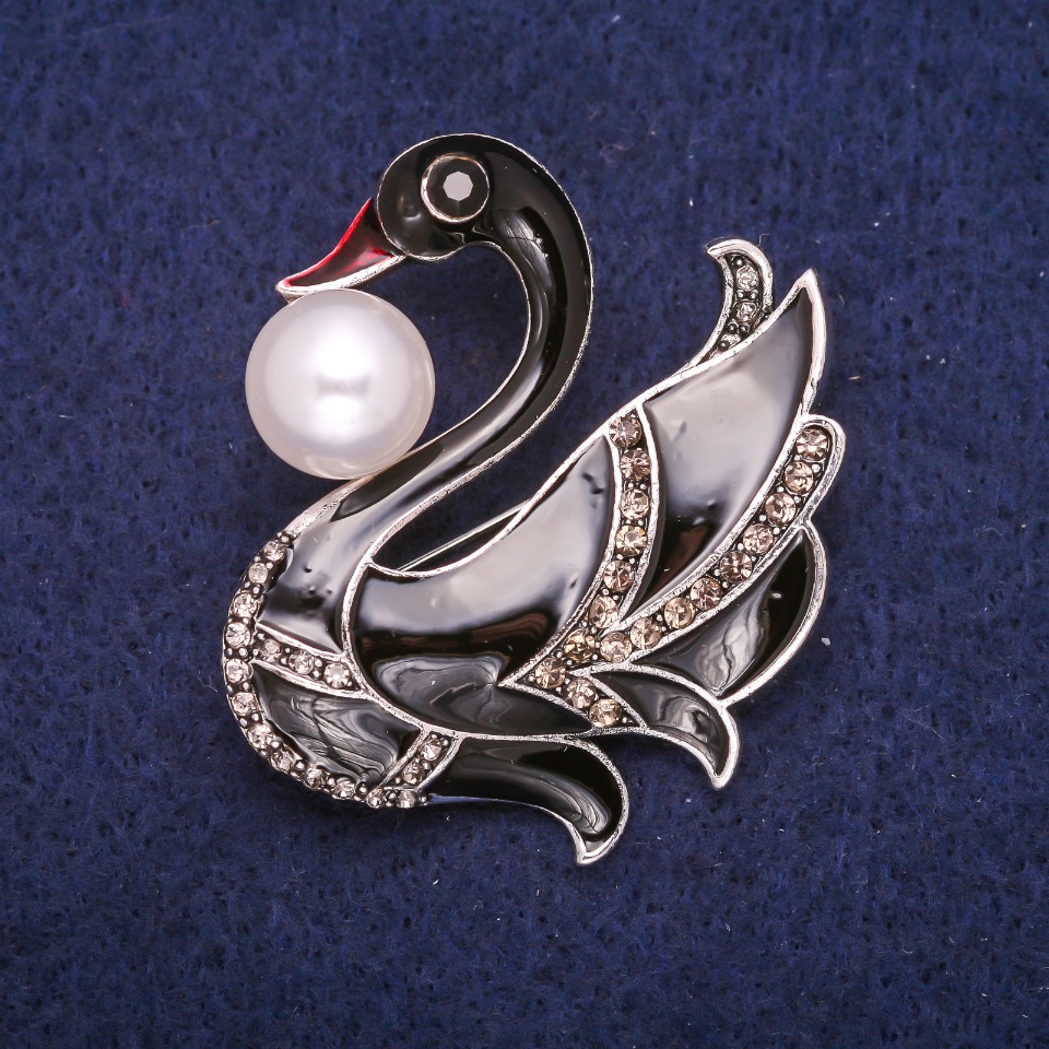 Brooch "Black Swan" with enamel, crystals and a bead, silver-toned metal 43×44 mm