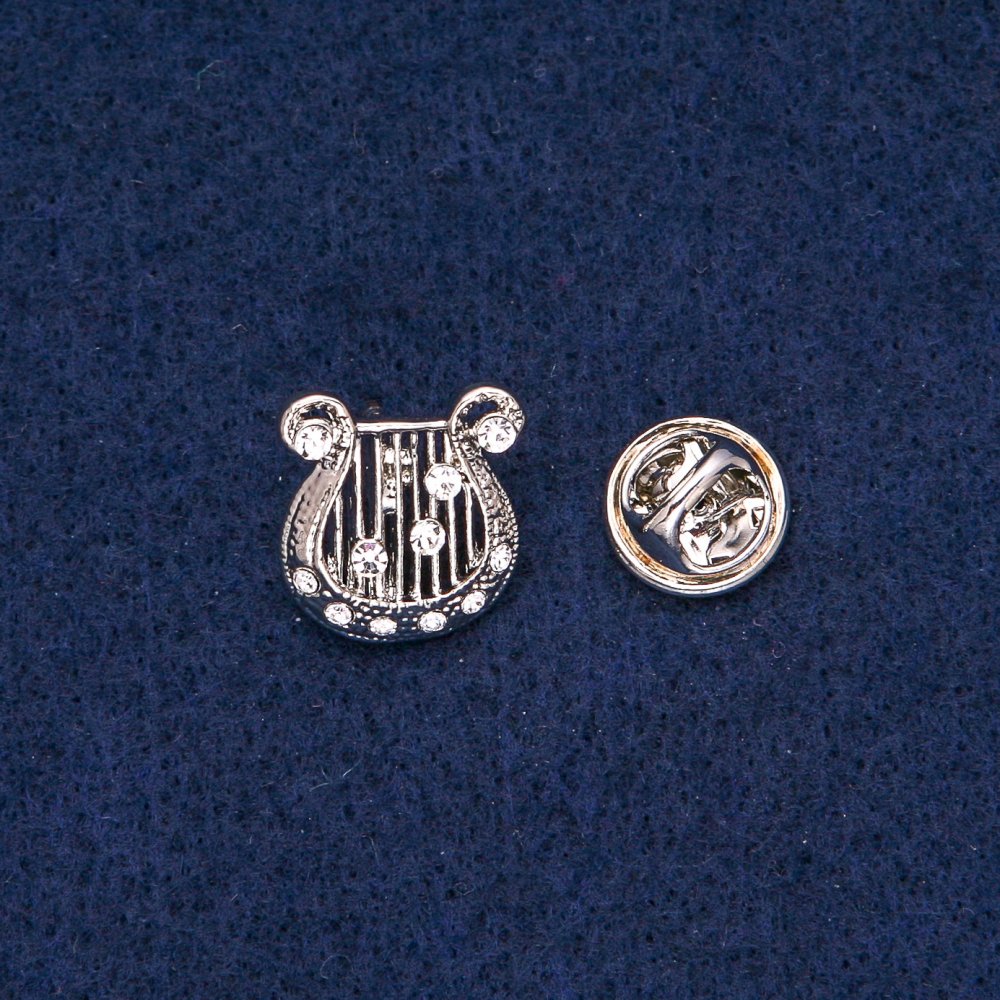 Брошка Ліра з білими стразами, сріблястий метал 17х15мм +