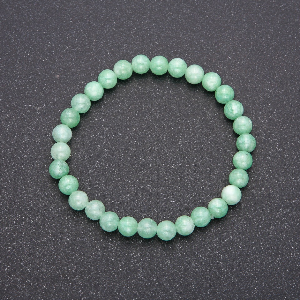 Bracelet made from natural Burmese jadeite on an elastic cord, smooth beads, diameter 6(±)mm, length 18 cm