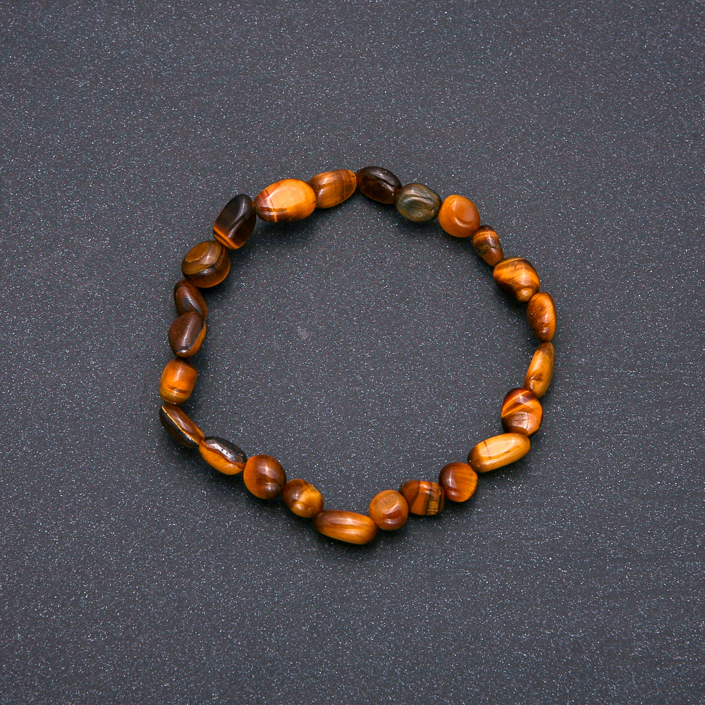 Bracelet made of natural Tiger's Eye on elastic, diameter 7x9 mm (±), circumference 18 cm