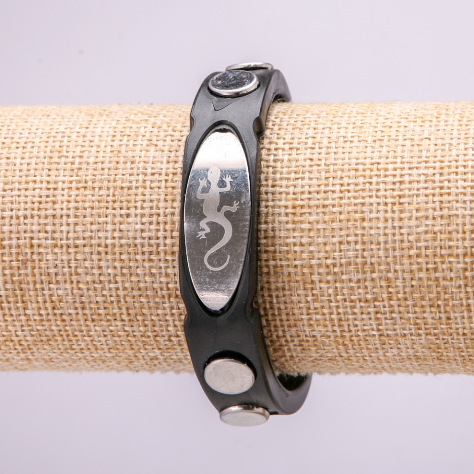 Bracelet with metal inserts, 21 cm long, 15 mm thick, black rubber, with a clasp