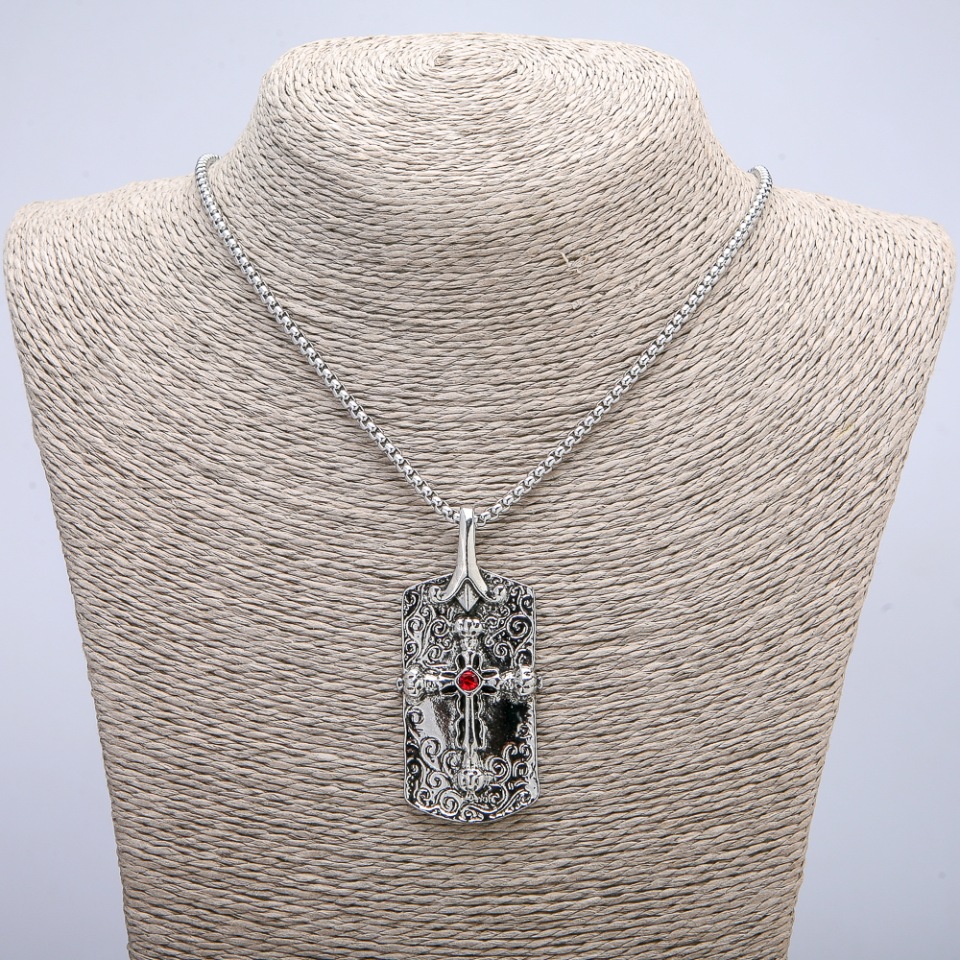 Pendant 'Cross' 62x28 mm on a chain, length 70 cm, silver-colored metal