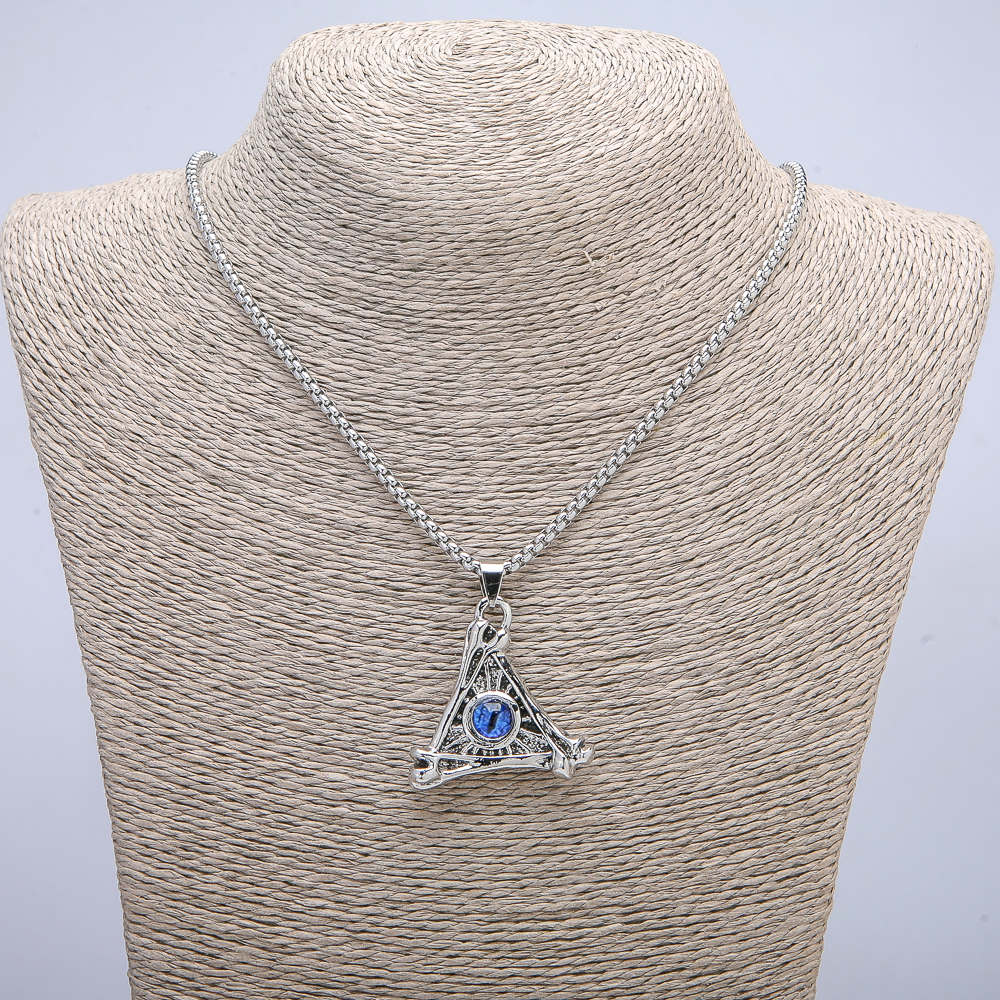 Pendant "Dragon's Eye in a Triangle" 40×35 mm on a chain, chain length 70 cm, silver-toned metal