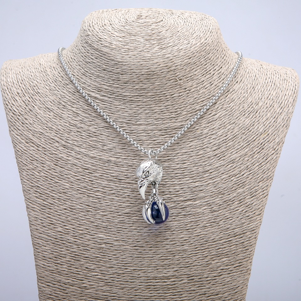 Pendant 'Bird with Ball' 47×18 mm on chain, length 70 cm, silver-toned metal