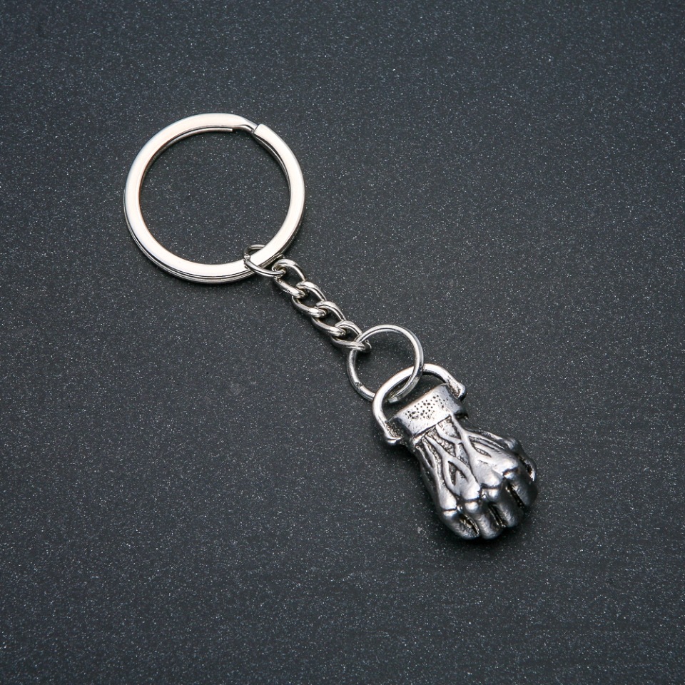Keychain 'Fist', diameter 32x18 mm, length 9 cm, silver metal