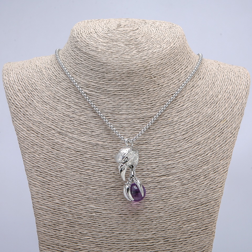 Pendant "Bird with a Ball" 47x18 mm on a chain, length 70 cm +/- silver-tone metal