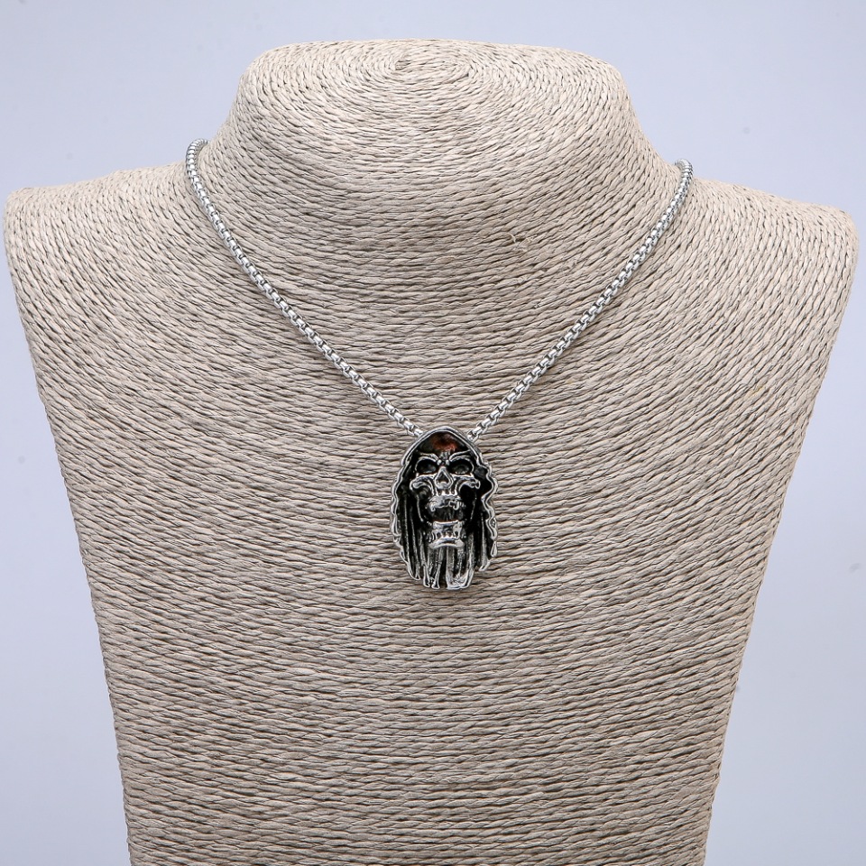 Pendant Skull 32×18 mm on chain, length 65 cm, silver metal color