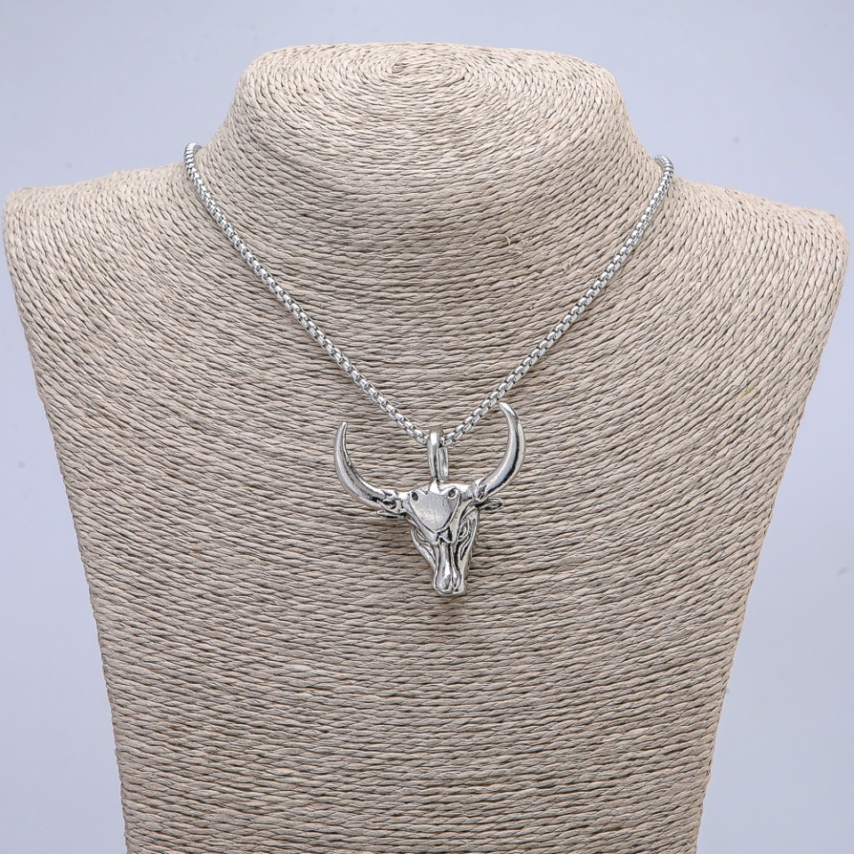 Pendant "Bull's Skull" 40x45 mm on a chain, length 70 cm, silver-toned metal