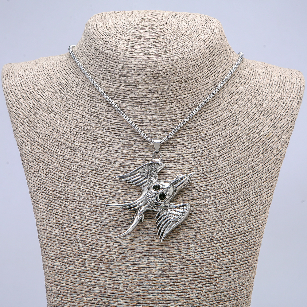 Pendant "Bird with a Skull" 50x57mm on a chain, length 65 cm, metal color silver