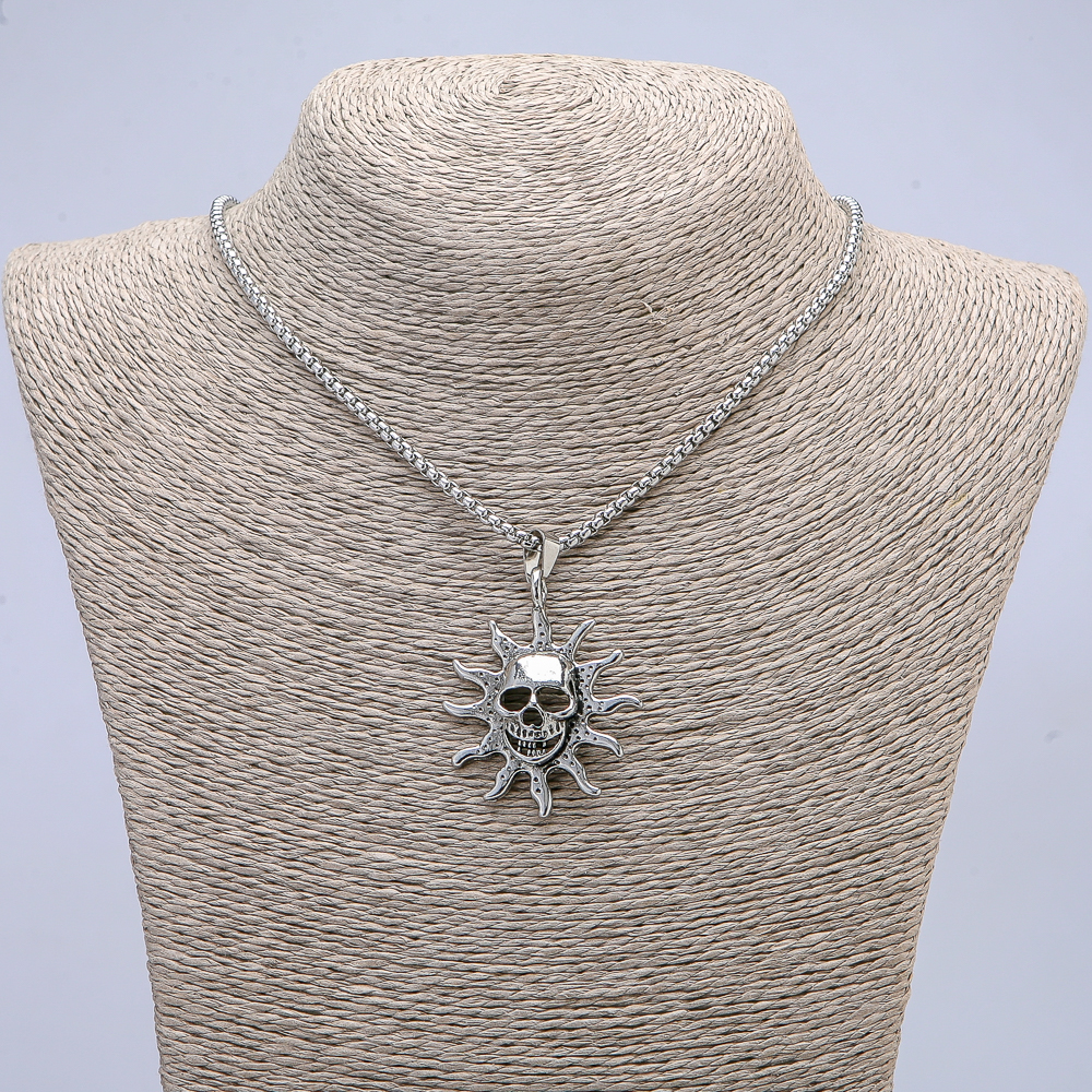 Pendant "Skull" 48×36 mm + - on a chain, length 70 cm + - silver-colored metal